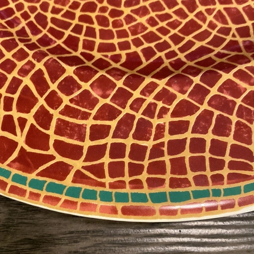 Pier 1 Mosaic Fruit large plate. Red with gold, green trim. 12.25” diameter.